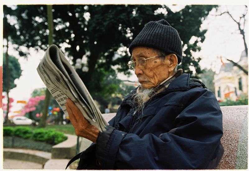 Read newspaper in Vietnam