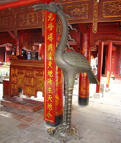 A crane on the back of the turtle in Vietnam