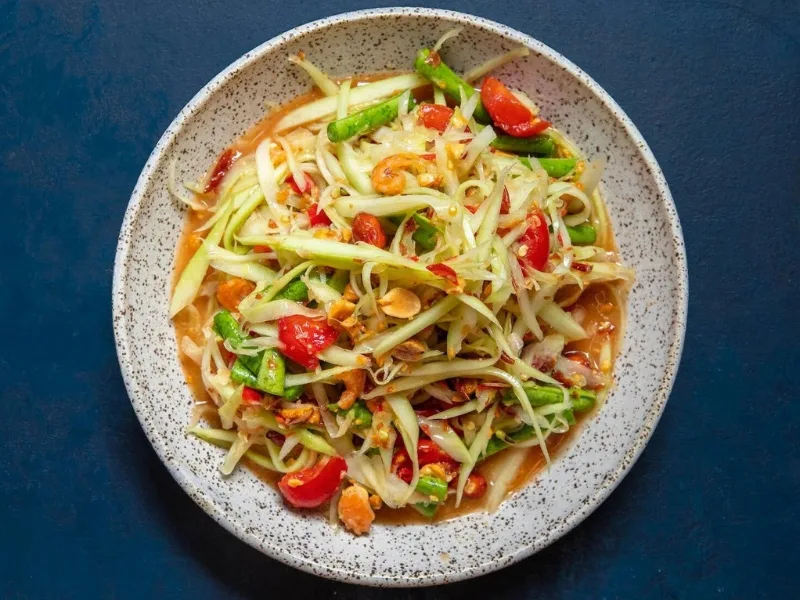 Goi du du - Vietnamese green papaya salad, crispy and savory, mingling freshness and spicy flavors