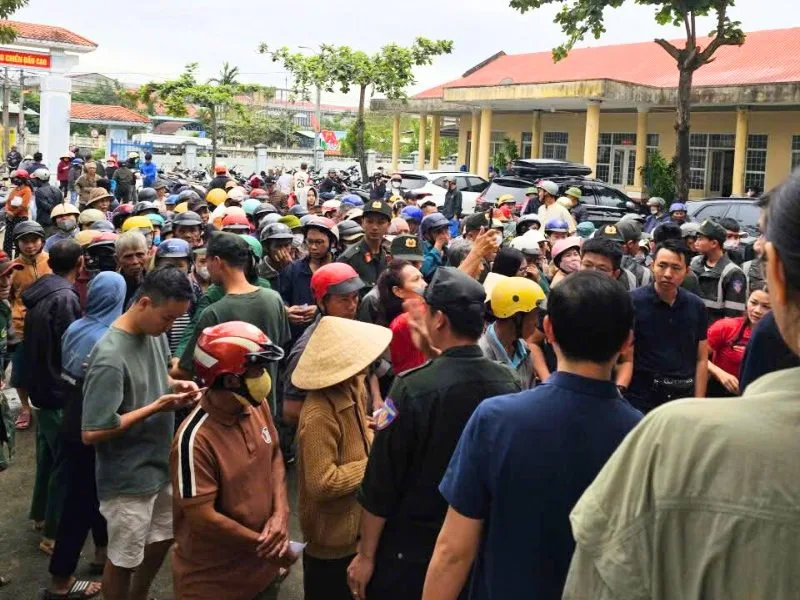 Families affected by the disaster gather to receive emergency aid